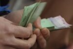 Деньги. Фото: скриншот YouTube-видео