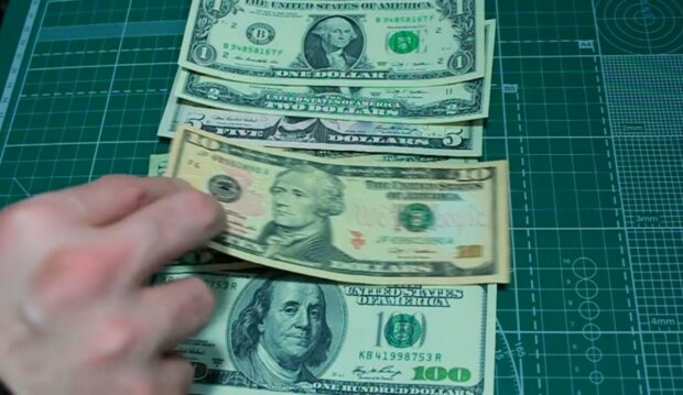 Доллар растет в цене. Фото: скриншот Youtube