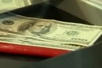 Доллар. Фото: скриншот Youtube-видео