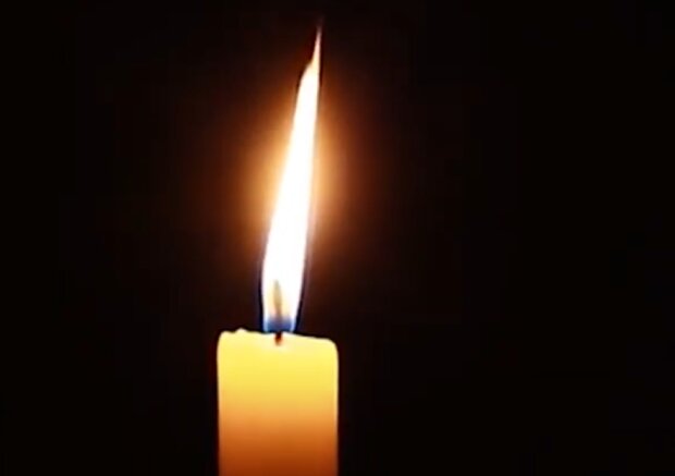 Свеча памяти.  Фото: скриншот YouTube-видео
